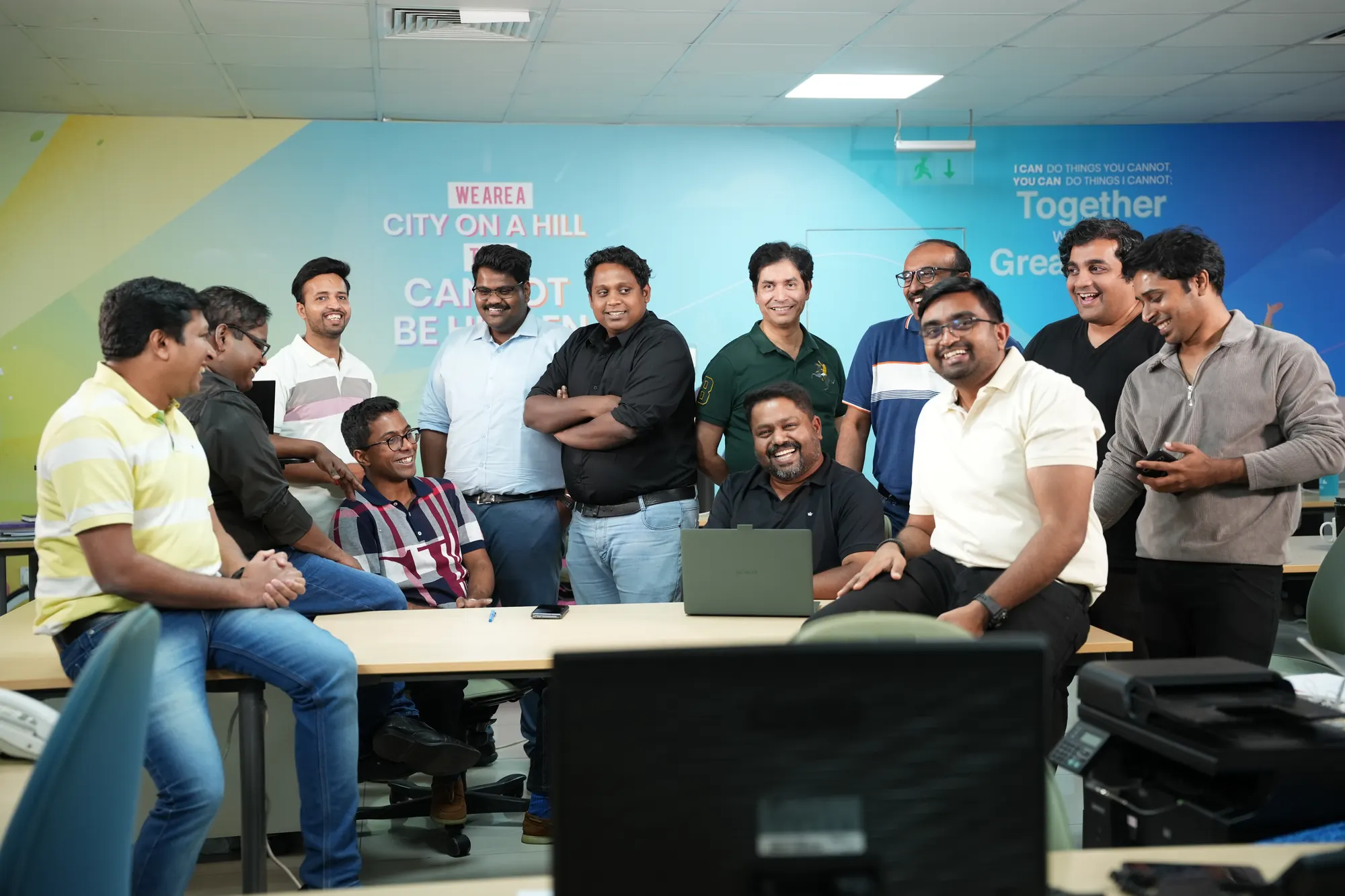 The GMI team together in the office